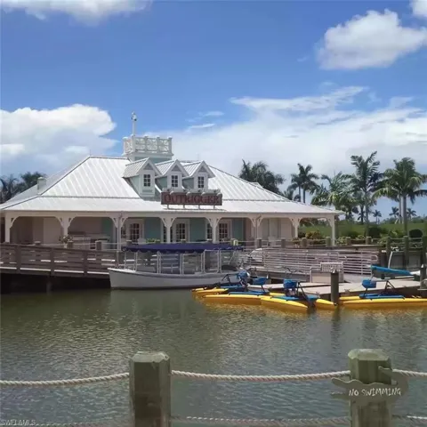 Dock featuring a water view and a gazebo