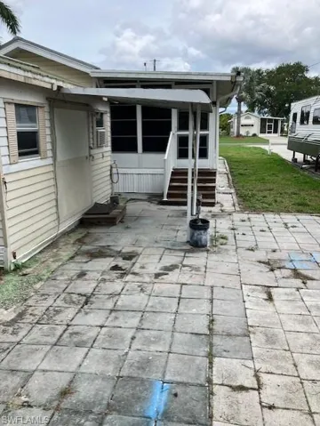 Back of property with a patio area