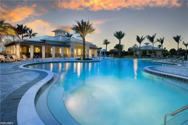 Community pool with a patio area