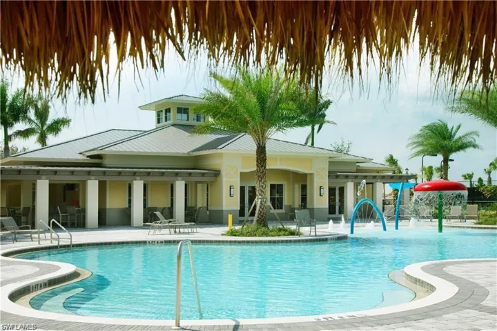 Community pool with a patio area