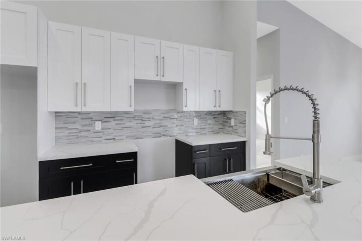 2705 E 9th  ST, LEHIGH ACRES, FL 33936