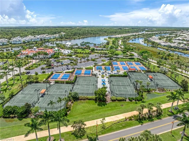 Aerial view of residential area featuring a large body of water