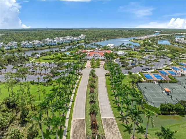 Aerial perspective of suburban area with a nearby body of water