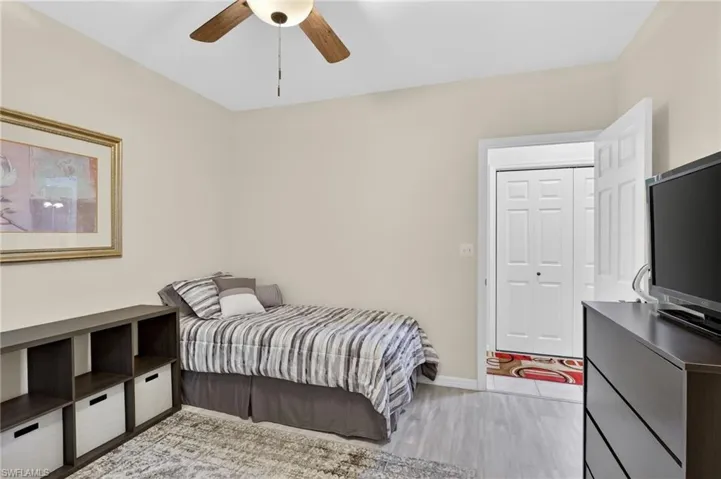 Bedroom featuring ceiling fan and light wood finished floors