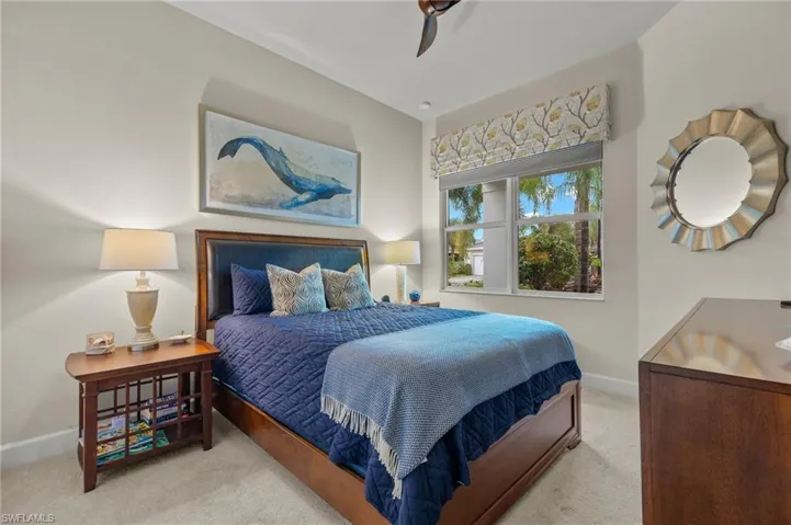 Spacious Bedroom with ceiling fan, and double closet.