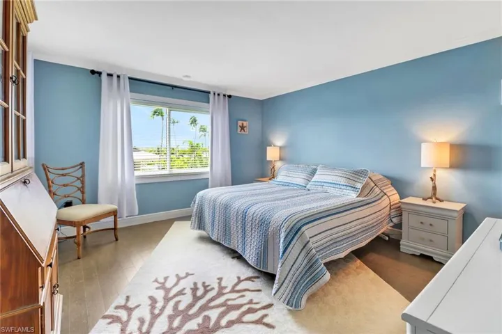 Bedroom featuring wood-plank flooring