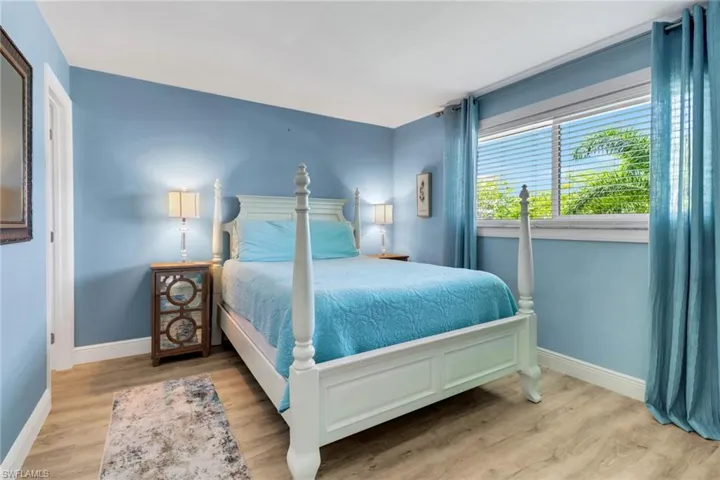 Bedroom featuring wood-type flooring