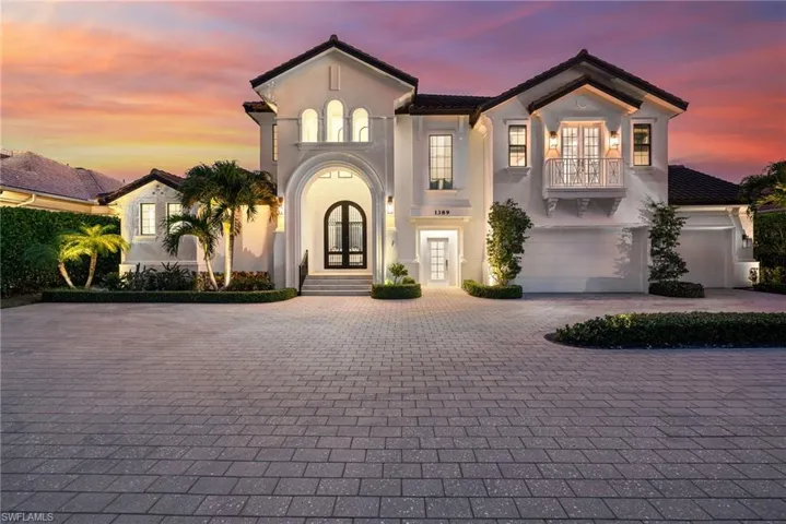 Mediterranean / spanish house featuring french doors and a garage