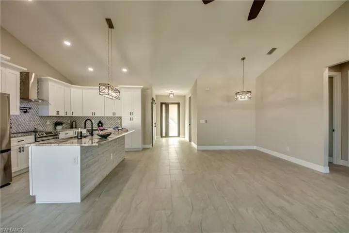 Looking back to the Front Entry Door.  Entryway to Guest bedrooms to the right