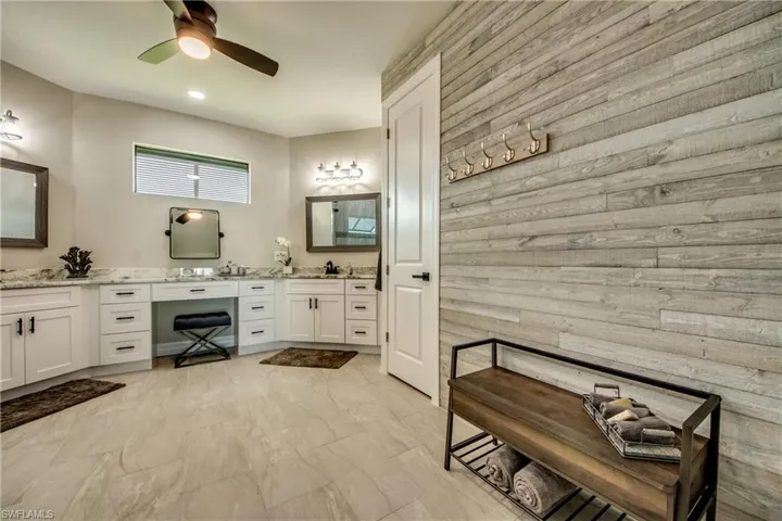Enter your Luxurious Master Bath past the Custom Shiplap Wall