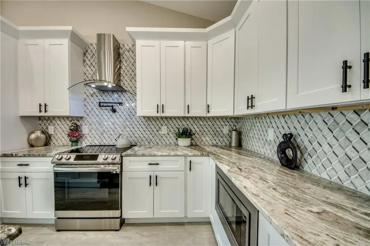 Upgraded Appliances with Acrylic Range Hood, Pot Filler, Under Counter Microwave, Convection Oven
