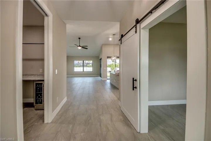 Entryway with Office/4th bedroom to the right and Laundry Room to the left