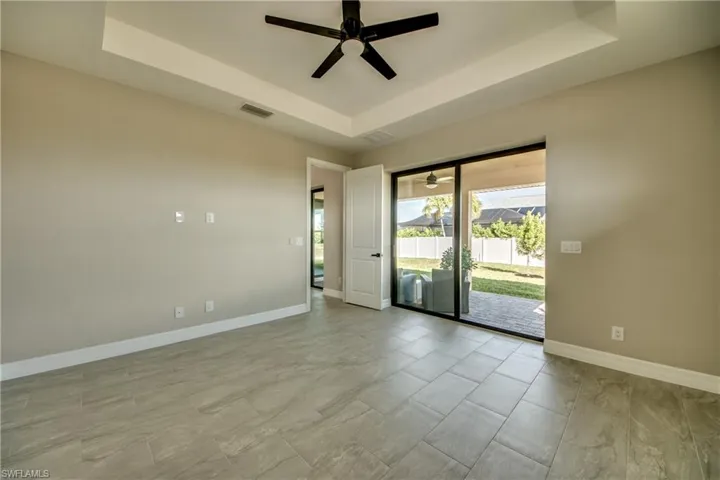 Trey Ceilings, 8ft door, Sliders that Pocket wide open from Master Bedroom to Lanai