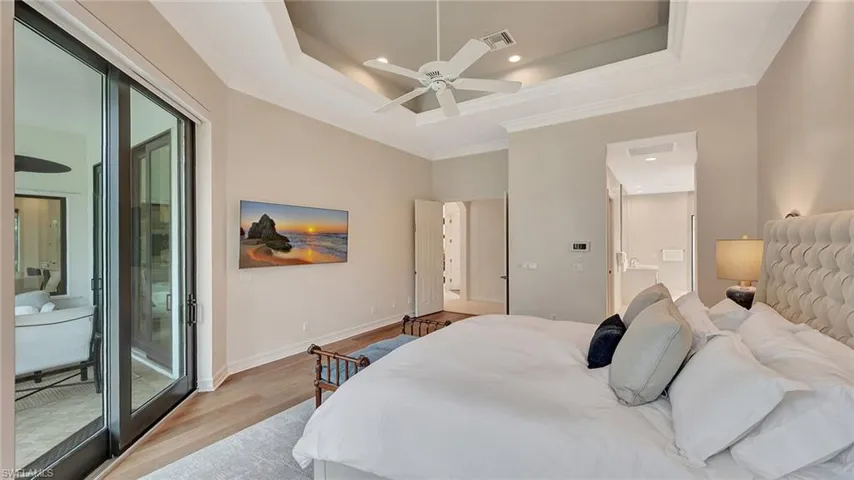 Primary Bedroom Suite with electric window blinds