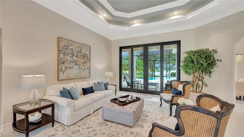 Formal Living Room with sliders to covered patio area.