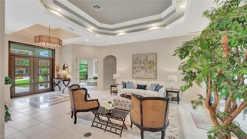 Formal Living Room opens to Den