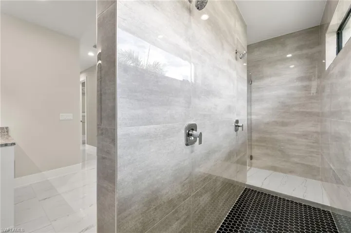 Bathroom with tiled shower