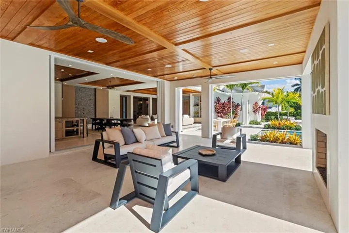 View of patio / terrace featuring a ceiling fan, outdoor dining area, and outdoor lounge area