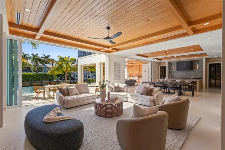 View of patio / terrace featuring outdoor dining space, a ceiling fan, and an outdoor living space