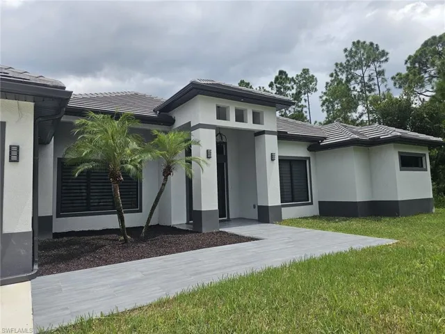 View of front of home with a front lawn