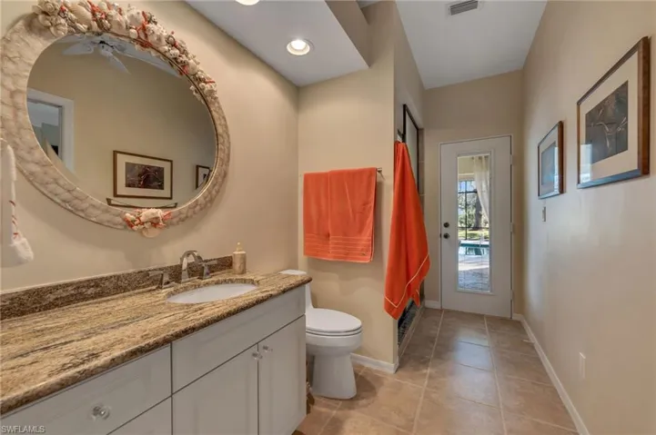 Guest bathroom serves as pool bath as well