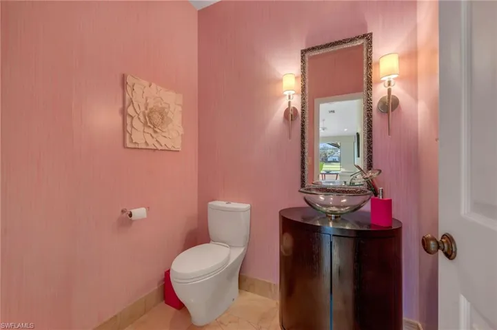 Powder room for guests. What fun style - anyone will smile walking in here!