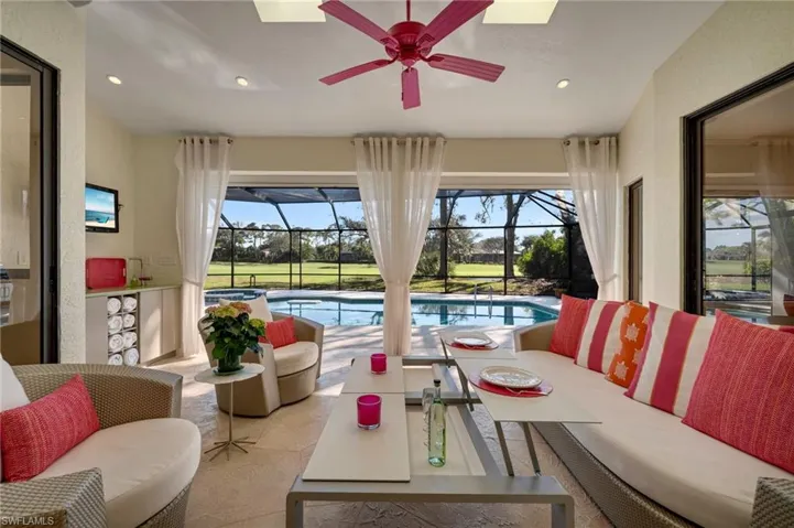 Covered lanai with wetbar area. Protected with hurricane shutters