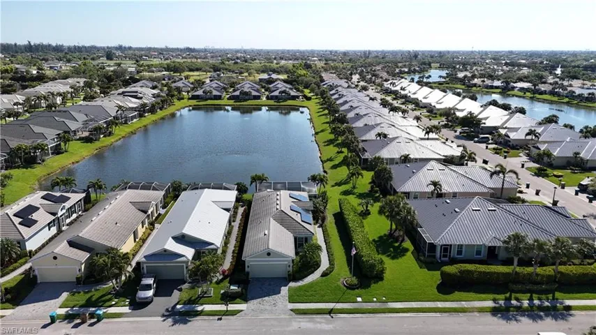 Bird's eye view with a residential view and a water view