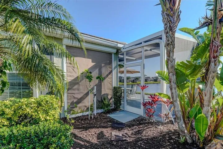 View of property exterior with a lanai