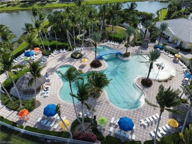 RESORT STYLE  SALTWATER COMMUNITY POOL WITH SLIDE AND TIKI'S