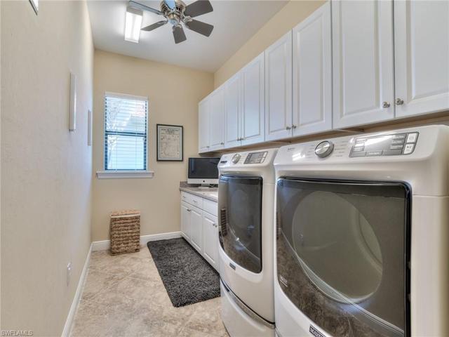 Laundry with new front-load washer and dryer 2023