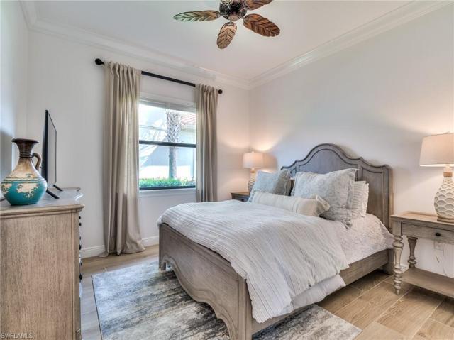 Guest bedroom #2 with new porcelain wide plank floors 2023 and walk-in closet