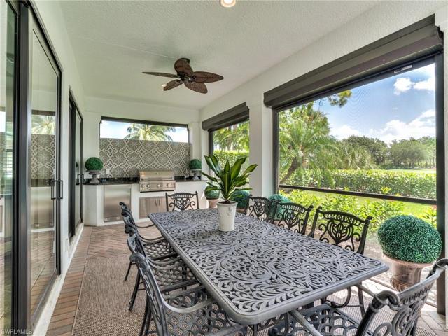 Outdoor kitchen and dining with new tile backsplash 2023 and new beverage center 2023