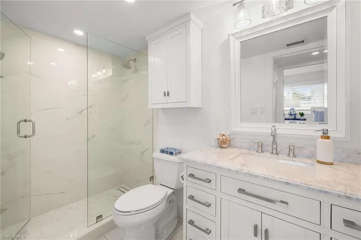 Powder Bath serves Guests with sophistication and comfort.  Dual Shower heads, Covered Drain