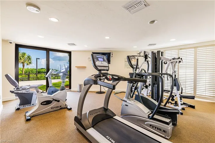 Exercise room featuring a textured ceiling