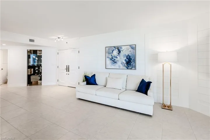 Tiled living room with ornamental molding