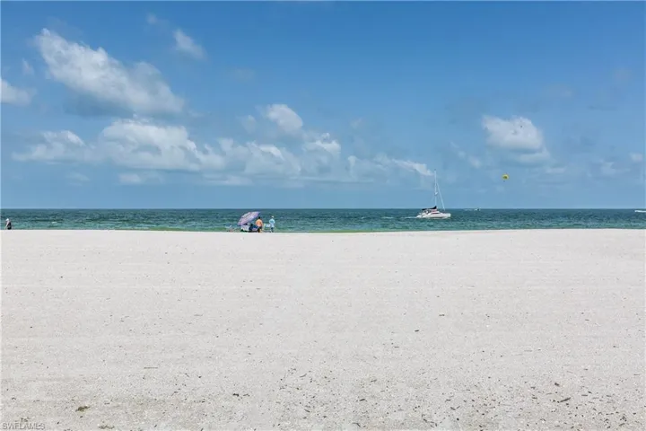 View of water feature with a beach view
