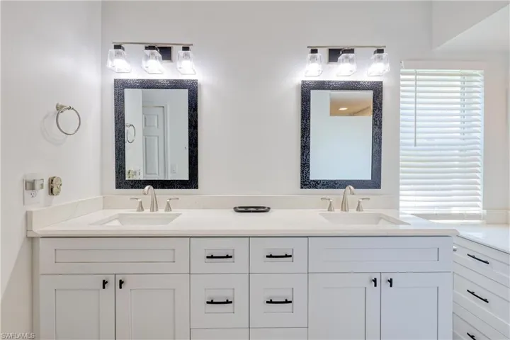 Primary Bathroom with Dual Sinks and Make-up area