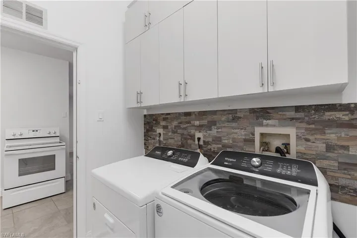 Clothes washing area with washer and dryer