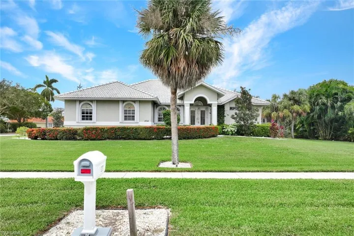 View of front of house with a front lawn
