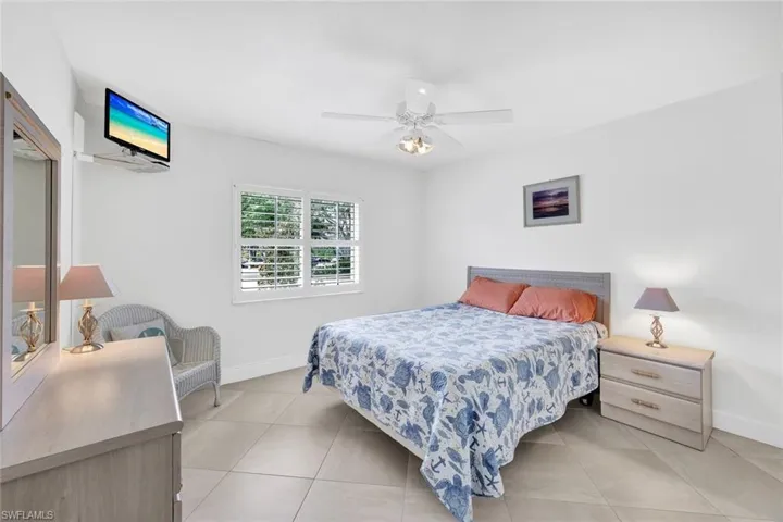 Bedroom featuring ceiling fan and light tile patterned floors