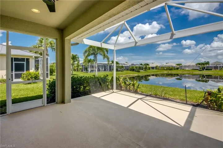 Unfurnished sunroom featuring a water view