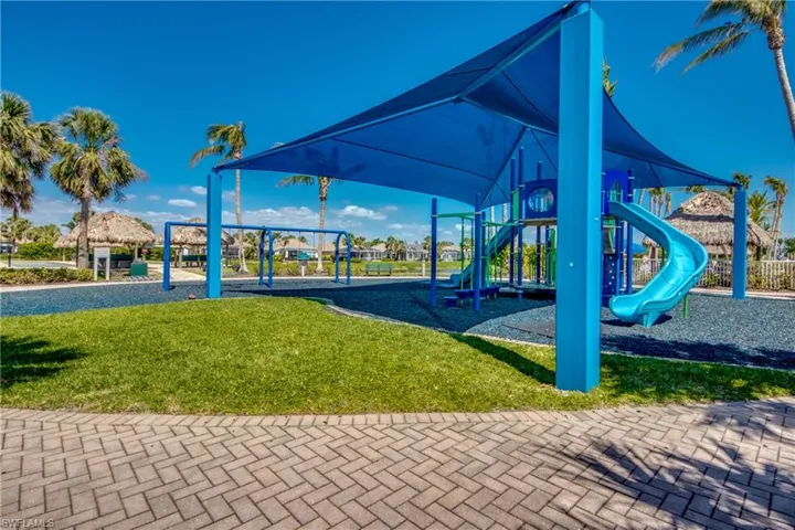 View of jungle gym featuring a yard