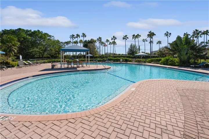 Community pool with a patio and a gazebo