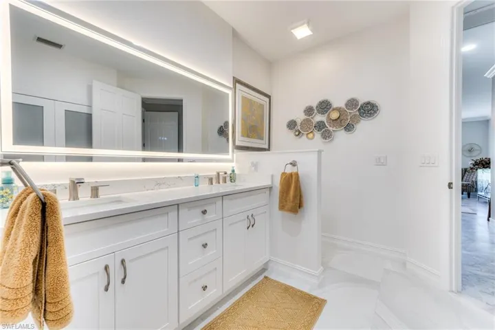 Dual vanities & backlit mirror