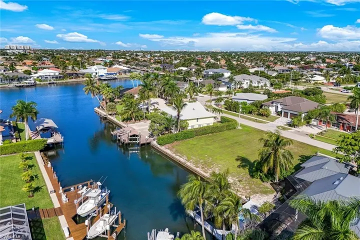 Aerial view of residential area with a nearby body of water