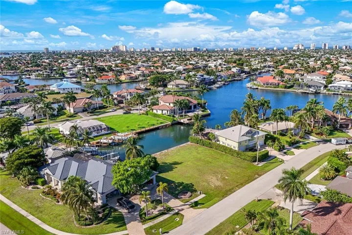 View of urban area with nearby suburban area and a large body of water
