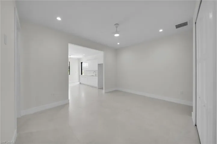 Unfurnished room featuring a ceiling fan and recessed lighting