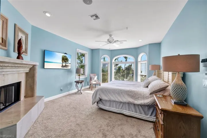 Primary bedroom with fireplace