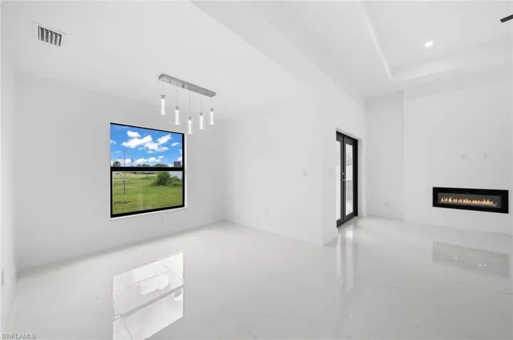 Empty room featuring tile patterned flooring